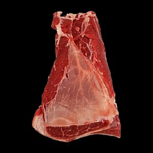 Sorra bovina su fondo nero: il taglio triangolare con la vena di grasso